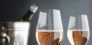 Close-up of two Glasses Rose / Pink Champagne, selective focus