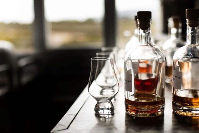 glasses on a bar with spirits