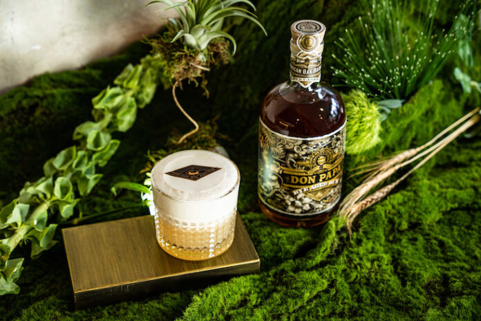 Don Papa aged rum with cocktail