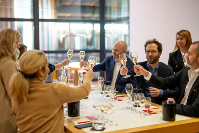 Executives at Cameron Mitchell Restaurants and Piper-Heidsieck toasting with their Champagne