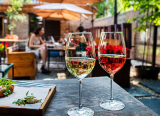 Experts Weigh In On Wines By The Glass two glasses of wine on a table