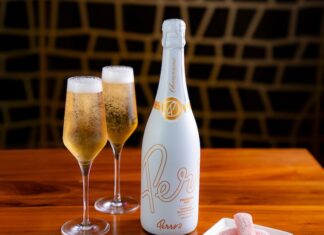 Perry’s Steakhouse Launches Exclusive Champagne Perry’s Steakhouse's Champagne bottle with two glasses