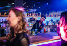 Leading Brands and On-premise Trends barman pouring drinks at the nightclub