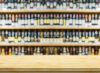 Johnson Brothers Expands Three Partnerships wine bottles on shelves