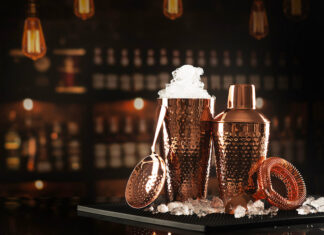 Presenting the 2026 Cheers Movers & Shakers Set of accessories for bartending. Shaker and glass for mixing cocktails made of copper. Set for making cocktails in copper color. Ice in glass for mixing cocktails.