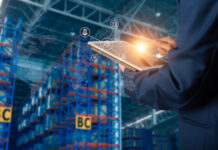 Beverage Distribution Software: AI Innovations or Repackaged Technology? Businessman manager using tablet check and control and planning for Modern Trade warehouse logistics
