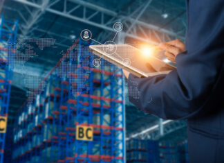 Beverage Distribution Software: AI Innovations or Repackaged Technology? Businessman manager using tablet check and control and planning for Modern Trade warehouse logistics